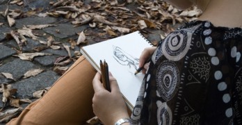 Every Day Sketches woman sketching on notebook