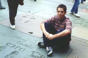 teen boy sits on sidewalk - How to Write a College Application Essay - So What Kind of Writing Is This