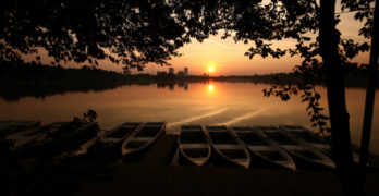Top 10 Ships, Sails and Boat Poems rowboats in sunrise