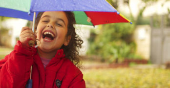 Help children read - child with umbrella