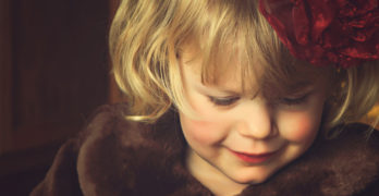Literacy Conversations girl in brown fur coat