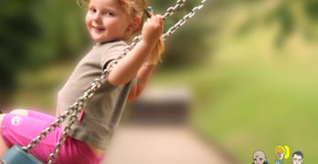 Take your Poet to School Week girl on swing