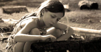 Ask Pearl girl playing with log