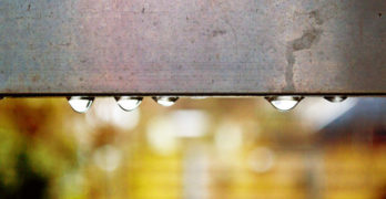 water droplets on metal beam