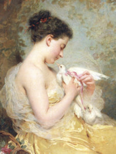 girl holding dove