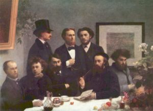 men gathered around a table surrounded by flowers and tea. one man smokes a pipe and holds a book
