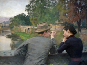 two lovers look at each other on a bridge
