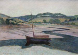 a boat is in the center with the tide low and a mountain/hill in the background