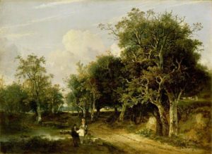 a man and a woman sit together in a garden