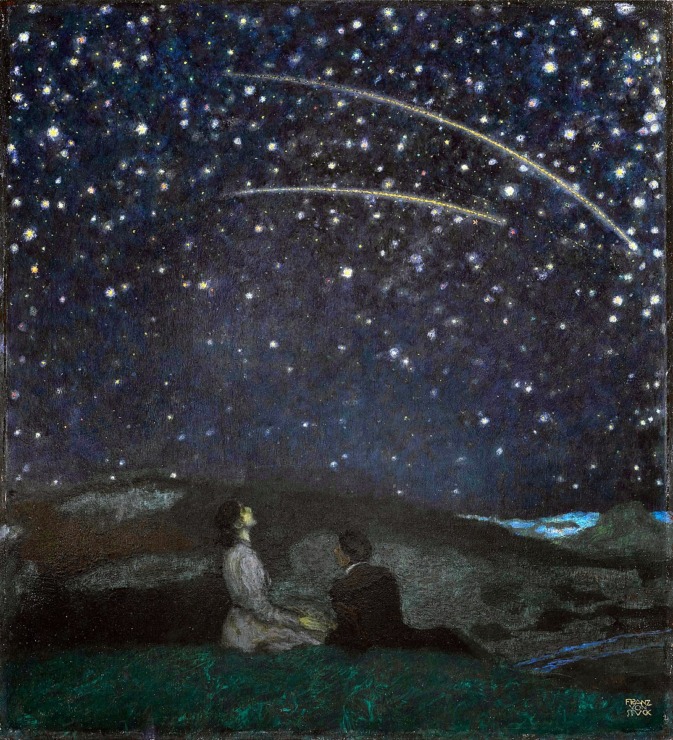 people sit on a hill and observe the night sky with shooting stars