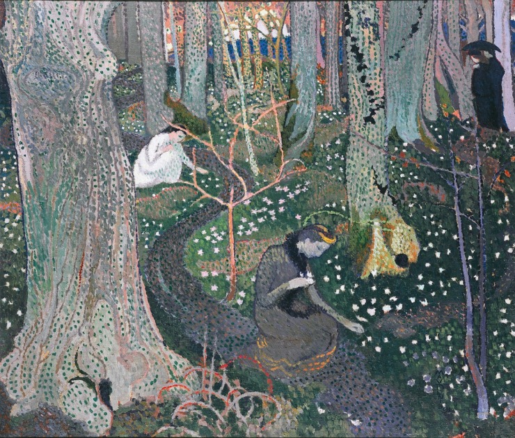 women gather in a meadow near a brook