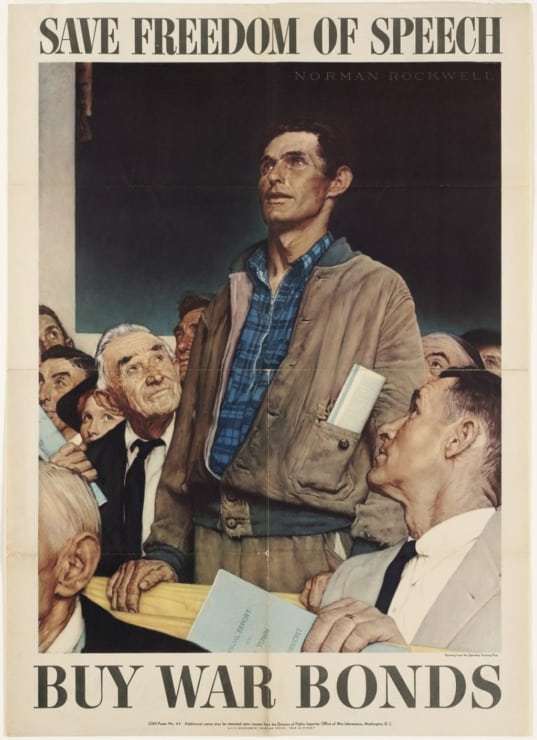 a man stands and speaks his truth