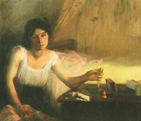 woman holding a trinket of sentimental value 