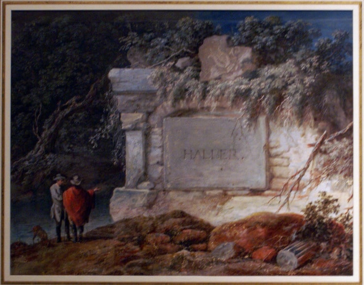 two men look up at mausoleum 