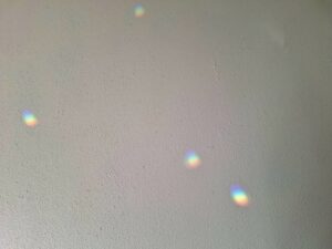 Bethany prisms on textured wall