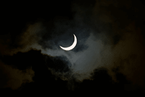 crescent moon in black sky